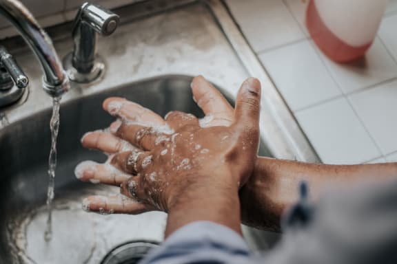 man_washing_hands at Siena Apartments, Santa Maria, CA, 93458