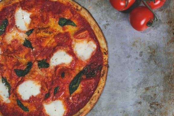 Image Of Pizza at Enclave Apartments, Texas, 79106