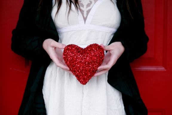 person_holding_red_heart at Spoke Apartments, Atlanta, GA