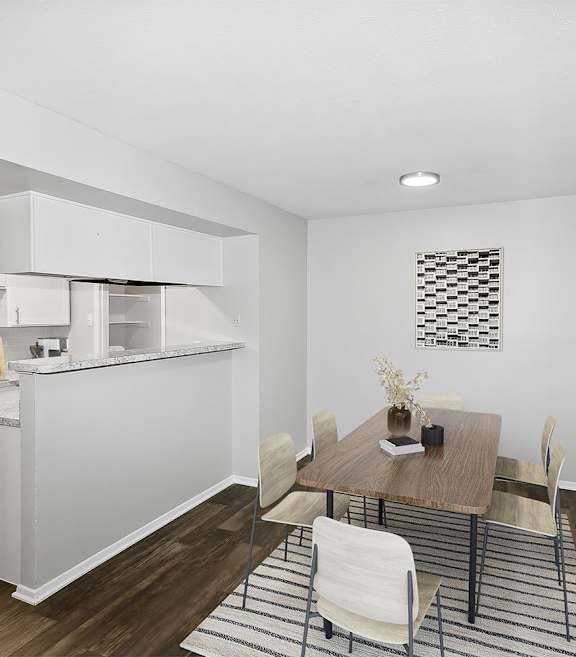 Model Bedroom with Carpet and Window View at Summit Ridge Apartments located in Arlington, TX.