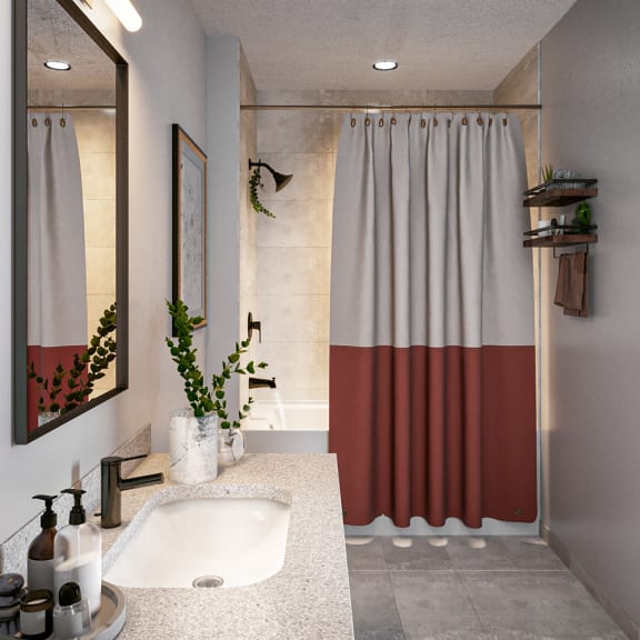 White beautiful bathrooms at Coda on Half with matte black fixtures and quartz countertops