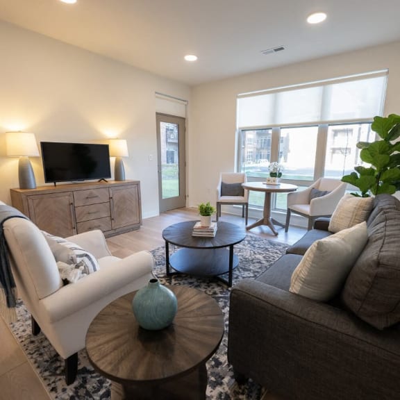 a living room with a couch and a table