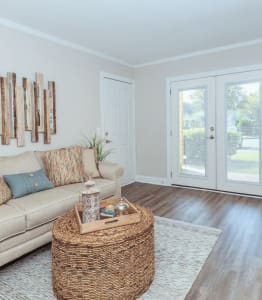 a living room with a couch and a table
