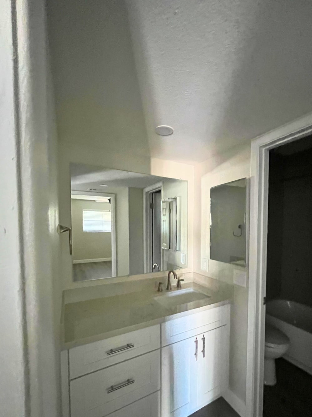 Apartment bathroom — representative home at East Vista.