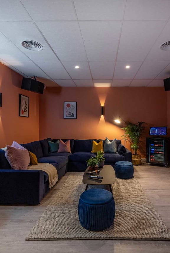 a living room with couches and a coffee table