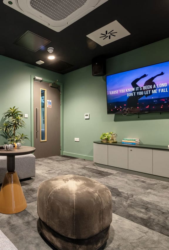 a living room with a tv and a couch
