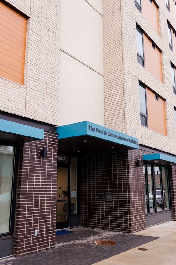 a building with a sign that reads the post  commonwealth court building