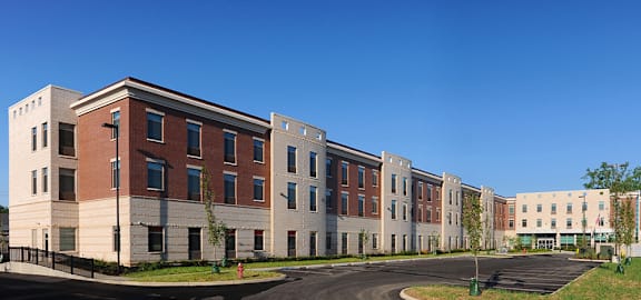A long building with a red brick facade.