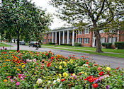 Thumbnail 7 of 28 - Beautiful Landscaping and Park-like Setting at Green Acres Apartments,Michigan, 48603
