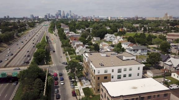 The Central Apartments for rent with downtown Minneapolis in the background