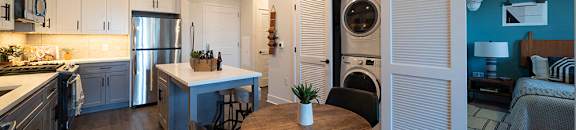Arlo Apartment Homes in Malvern, PA - Kitchen, Dining, Washer and Dryer in Unit