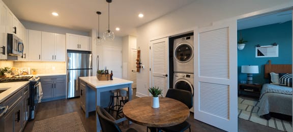 Arlo Apartment Homes in Malvern, PA - Kitchen, Dining, Washer and Dryer in Unit