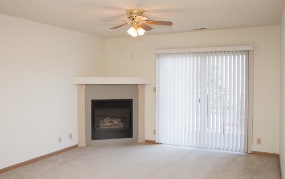 Cozy gas fireplace in living room at Northridge Heights apartments in north Lincoln