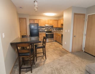 Attached dining area looking into corner kitchen at Highland View