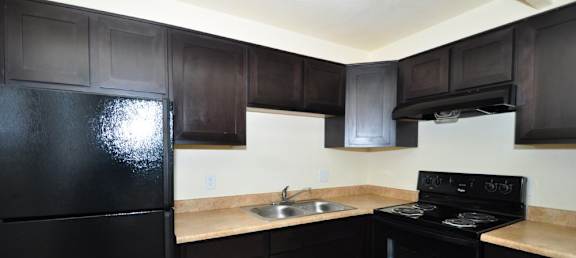 Kitchen with Dark Cabinets at Peppertree