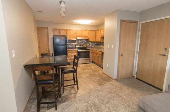 Attached dining area looking into corner kitchen at Highland View