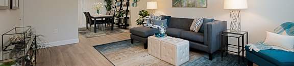 a living room with couches and a coffee table