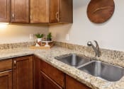 Thumbnail 11 of 26 - kitchen counters with sink and decorations