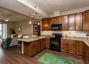 Thumbnail 9 of 26 - spacious kitchen with modern appliance and wide countertops