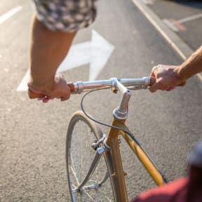 a person is riding a bike on the street