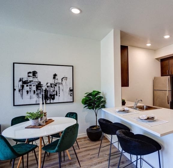 the reserve at city center spacious kitchen with island and dining table at Commons at Sylvan Canyon Apartments, Portland, OR, 97221
