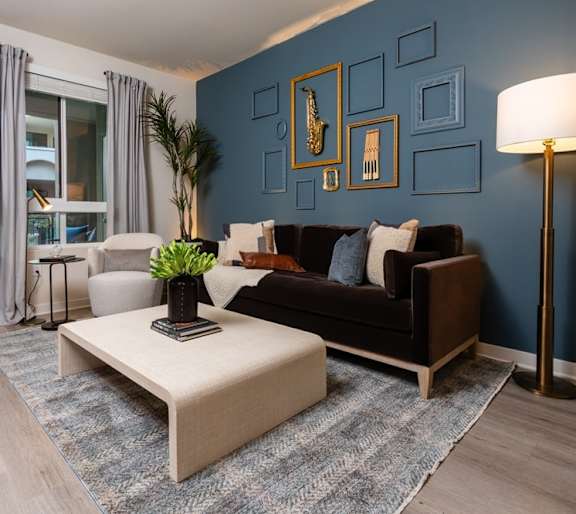 A Living Room With a Brown Couch at North Grove, Riverside, 92501