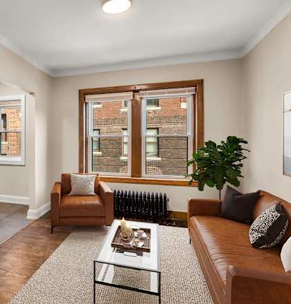 a living room with a couch and a table