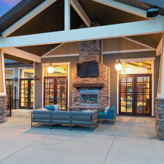 the preserve at ballantyne commons covered patio with fireplace