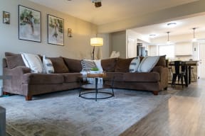 a living room with a couch and a table