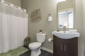 Gale Lofts Spacious Bathroom with Vanity and Large Shower Tub