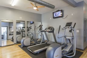Gale Lofts Apartments Fitness Center with Ellipticals, Treadmill, and Full Body Mirrors