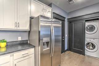 Side by side stainless steel refrigerator at The Helen