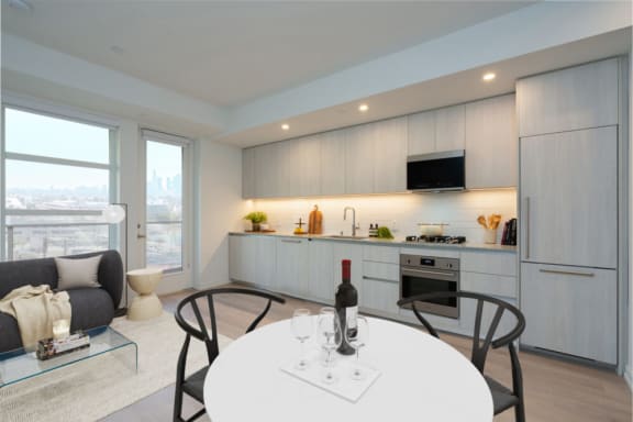 a kitchen and dining area in a 555 waverly unit