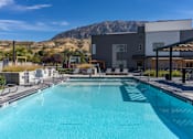 Thumbnail 2 of 74 - Picturesque Pool And Cabana Setting at The Flats at Riverwoods, Utah, 84604