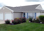Thumbnail 1 of 9 - Olmsted Township OH Apartment Rentals Redwood Arbors Of Olmsted One Car Garage Front