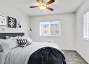 Thumbnail 8 of 9 - Bedroom With Ceiling Fan at Holiday Gardens, Colorado