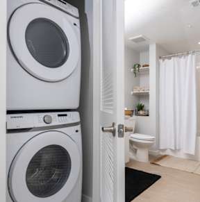 A white washing machine and dryer