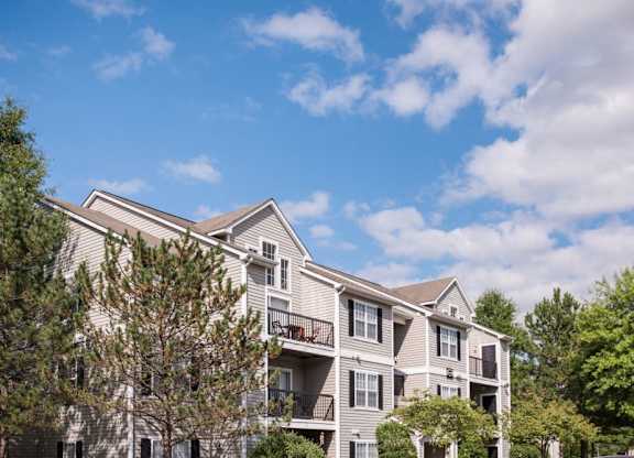 a three story apartment building exterior