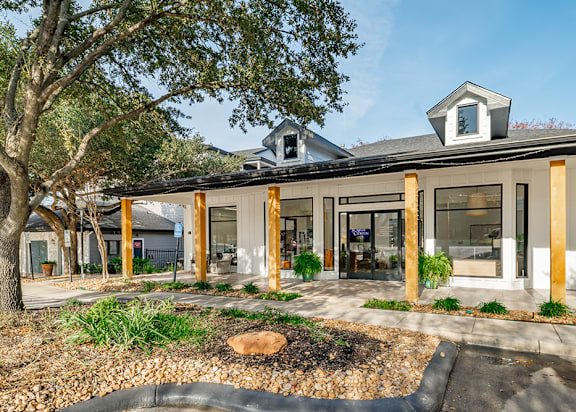 A wooden structure with the words Yard Additions written on it.