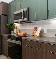 A Kitchen With Brown Cabinets at North Grove, Riverside, California
