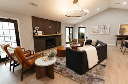 a living room with a couch and a table