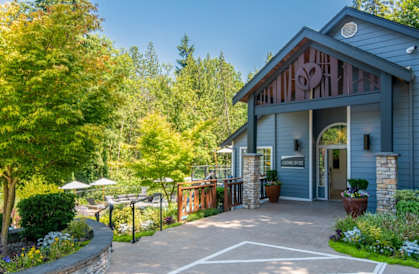 a patio in front of a building with a porch at Lakemont Orchard, Washington, 98027