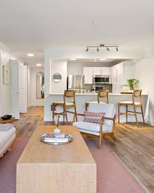 a living room with a couch and a coffee table at Lakemont Orchard, Issaquah, 98027