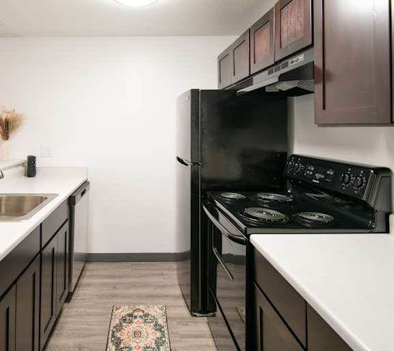 Interior kitchen view of Riverwood Apartments in Kent, WA