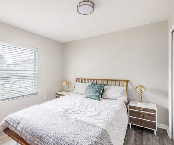 Bedroom with a bed and a window, Rolling Hills Apartments