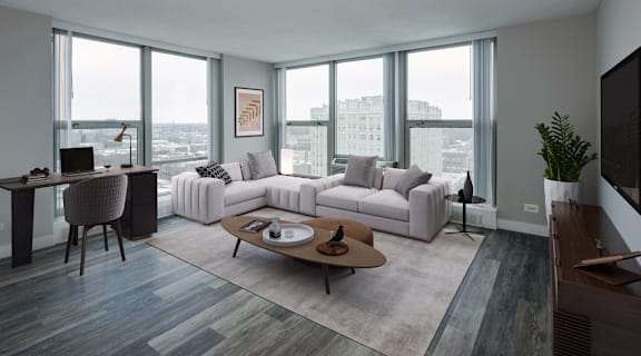 a living room with a white couch and a coffee table