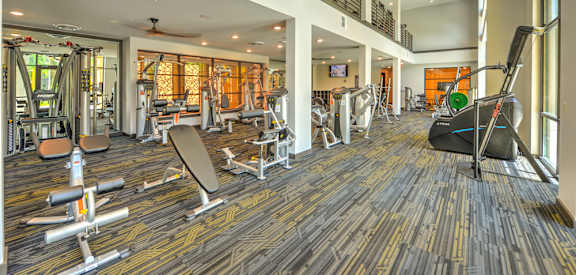 2 Story Fitness Center with Cardio Machines at Fusion Apartments in Jacksonville, FL 32256