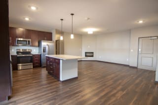 Large open floor plan living room and kitchen space at 360 at Jordan West