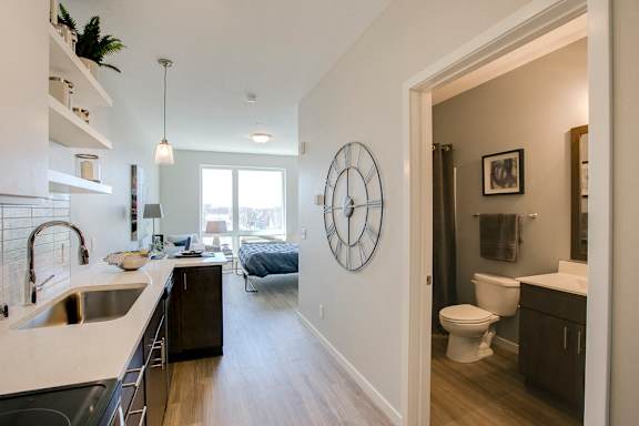Kitchen with white subway tile at The Central apartments near downtown Minneapolis MN 55408
