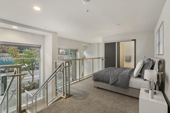 a bedroom with a bed in a room